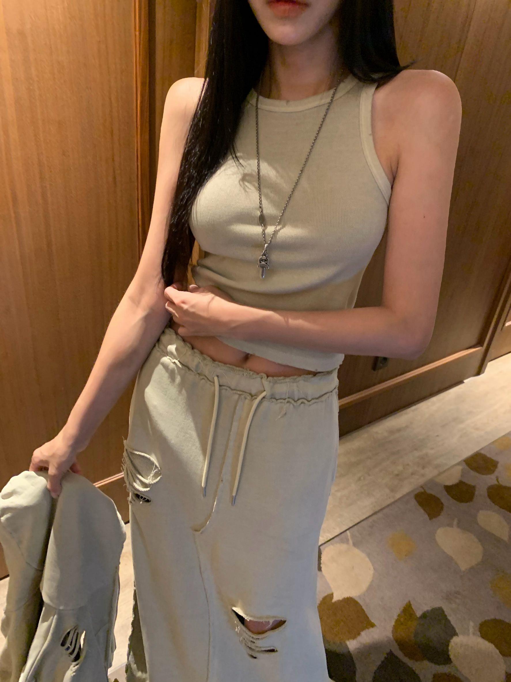 破損滾邊坑條棉背心